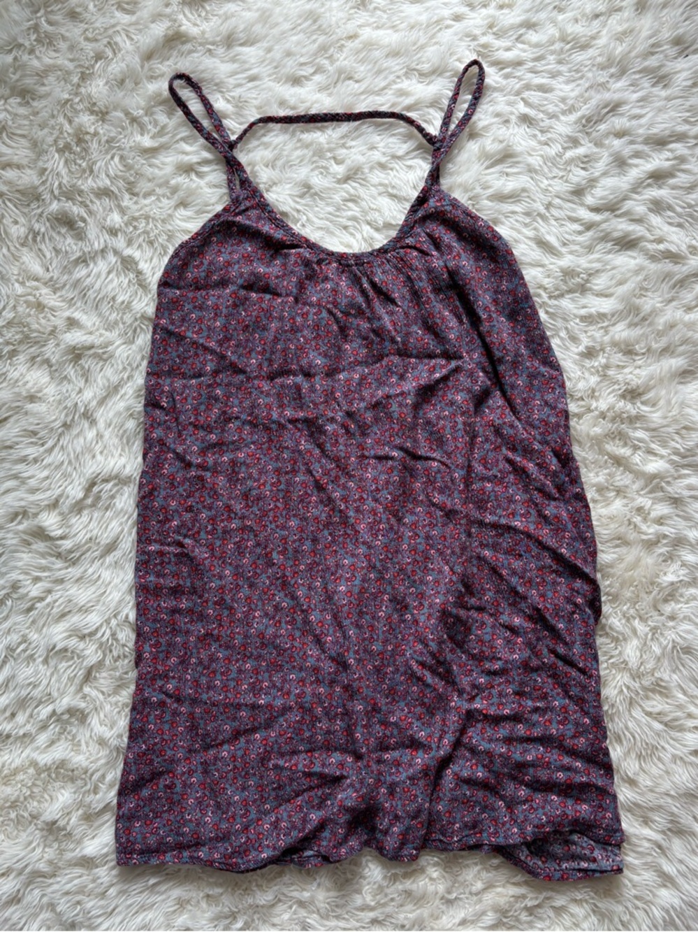 happening in the present Burgundy Floral Slip Tank Top
